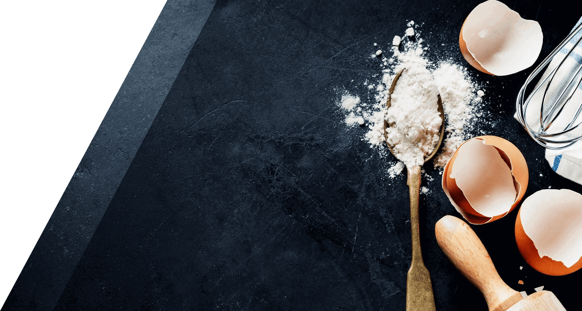 A person holding spoons with flour on them.